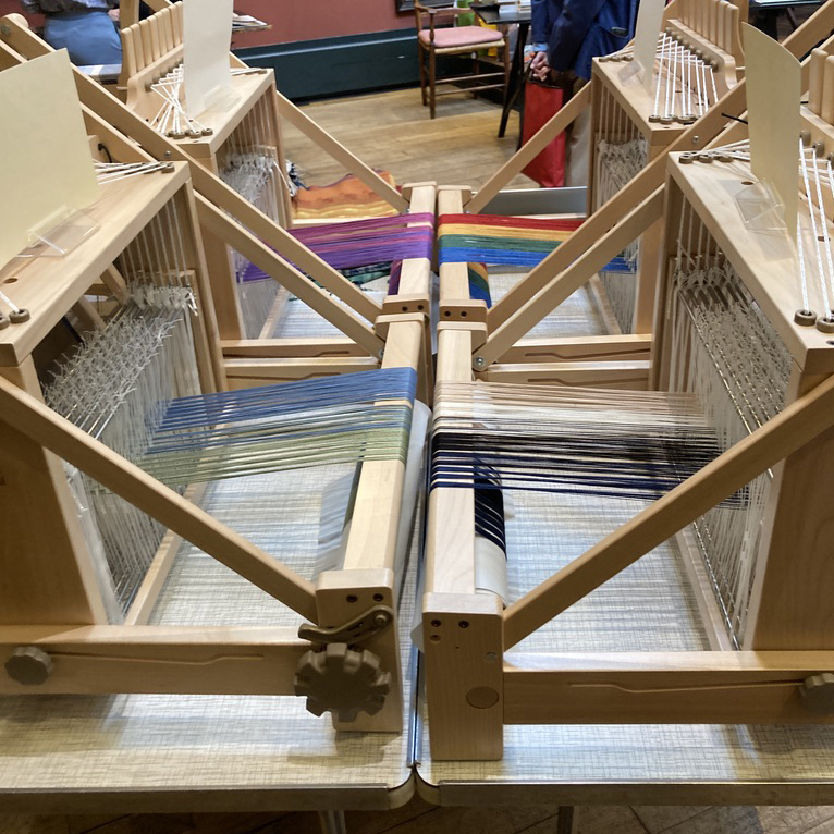 Image of table looms set up for a weaving workshop