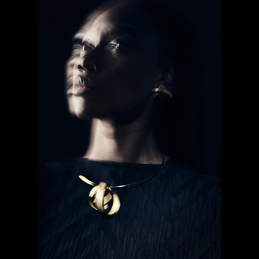 Sculptural necklace by artist jeweler Ute Decker. Photography by Xavier Young.