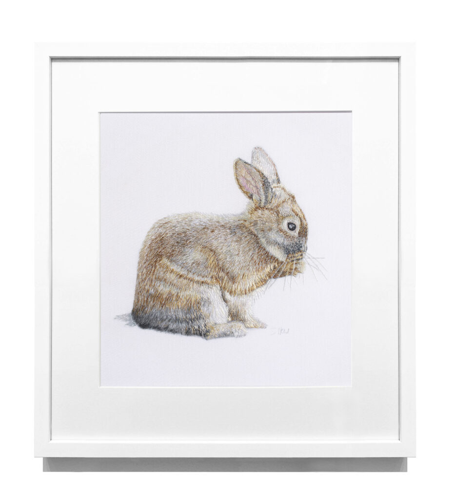 Hand embroidered rabbit artwork