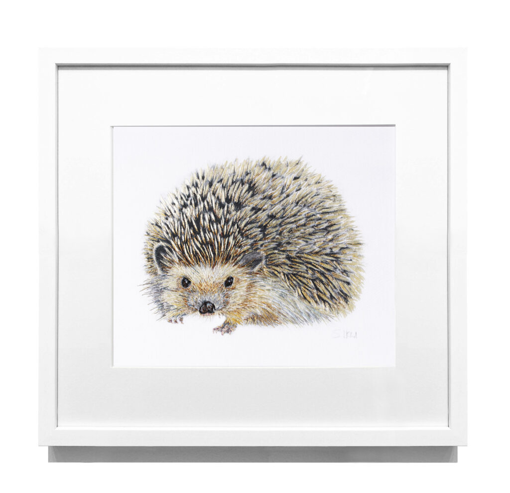 Hand embroidered hedgehog artwork