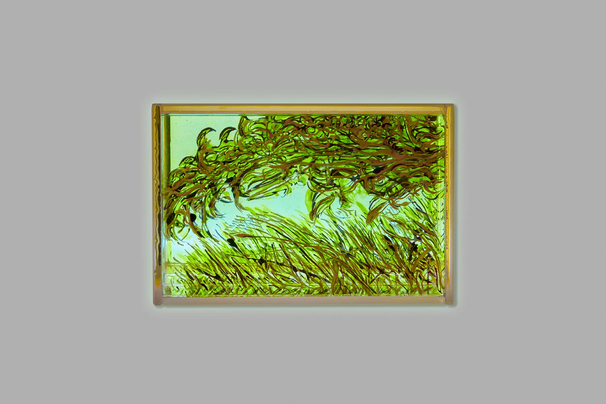 Nature- inspired glass artwork by Helen Brough. painted and kiln-fired like stained glass, showcasing vibrant green and yellow tones with flowing foliage designs illuminated by light.