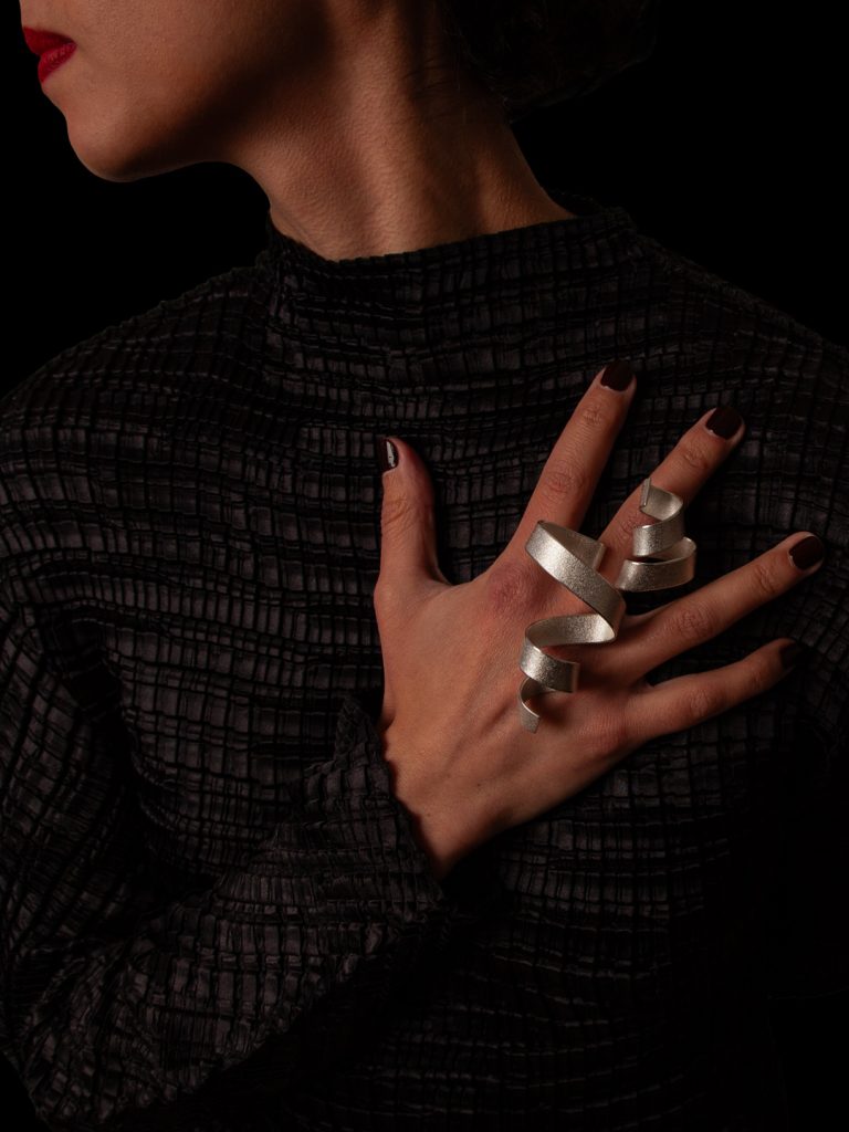 Calligraphy hand sculpture by ute decker - art jewellery